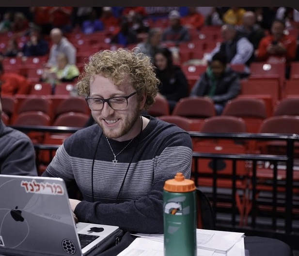 Dylan Manfre covering a Maryland women's basketball game.